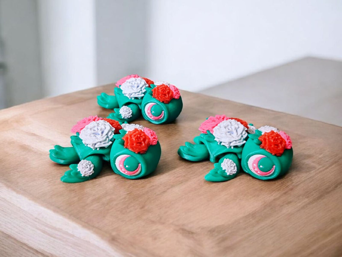 Three articulated floral turtles, 3D printed by PrintWorx3D