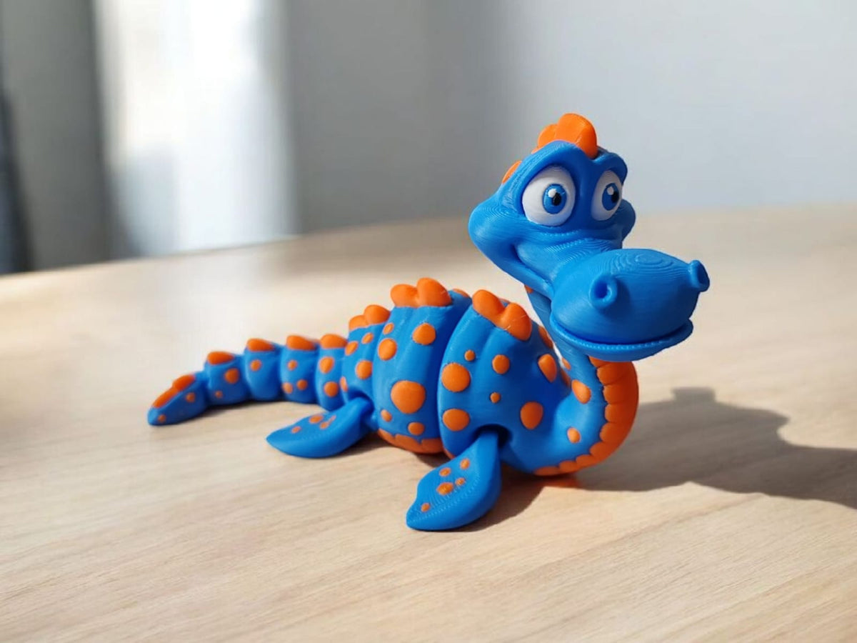 Blue articulated sea monster creature with long flexible body