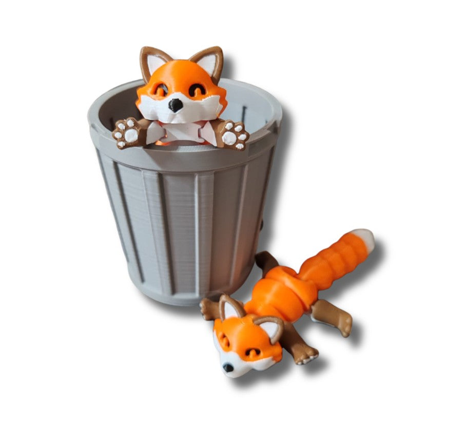 Orange fox figurine with poseable limbs and tail