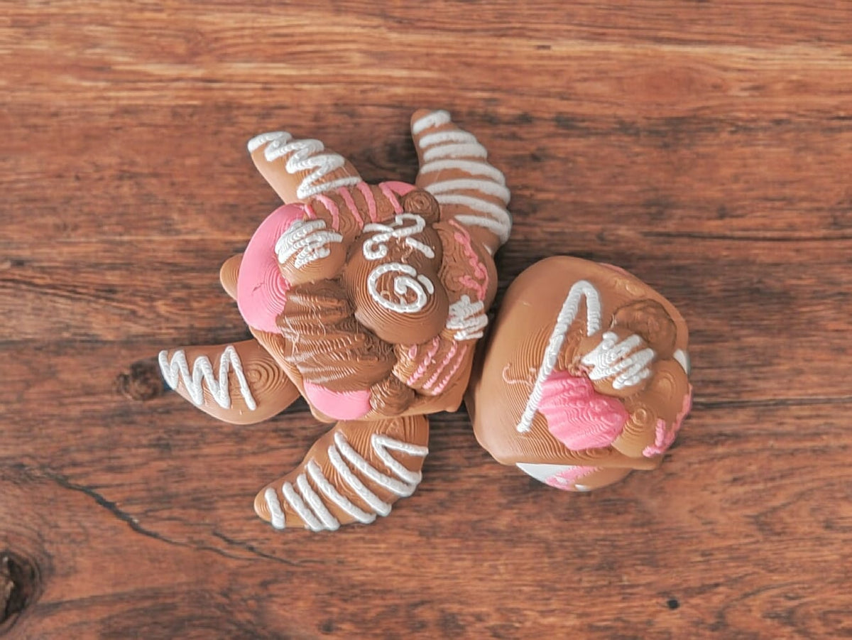 Side view of brown chocolate turtle figurine showing articulated segments