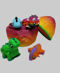 Four colorful dinosaur hatchlings emerging from collectible egg