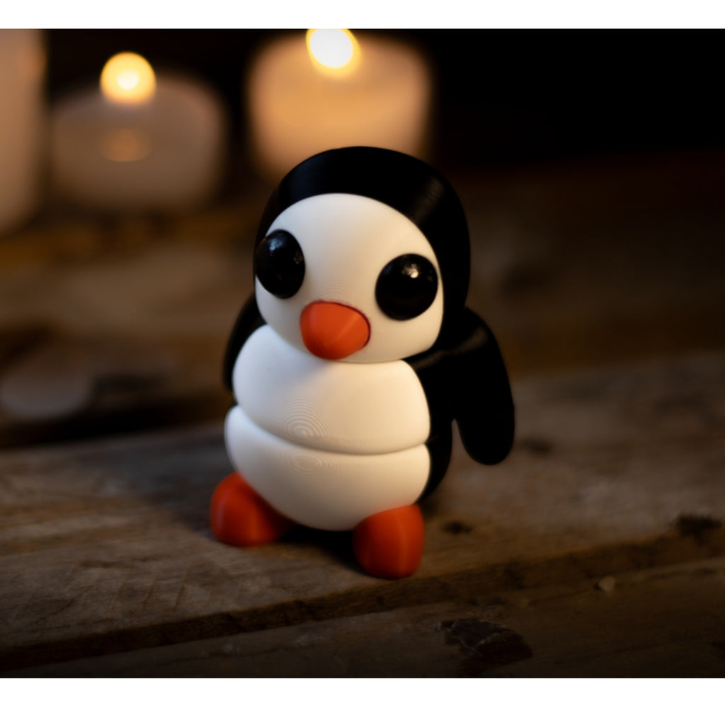 Black and white flexible penguin figurine